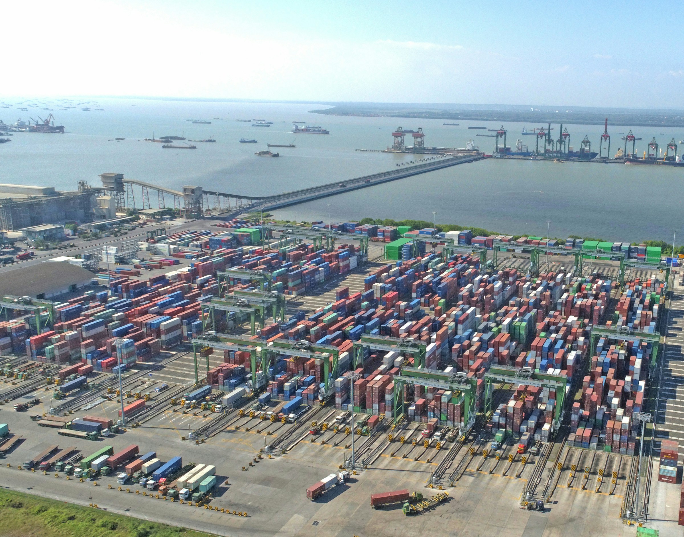 Containers and cranes at an international shipping port